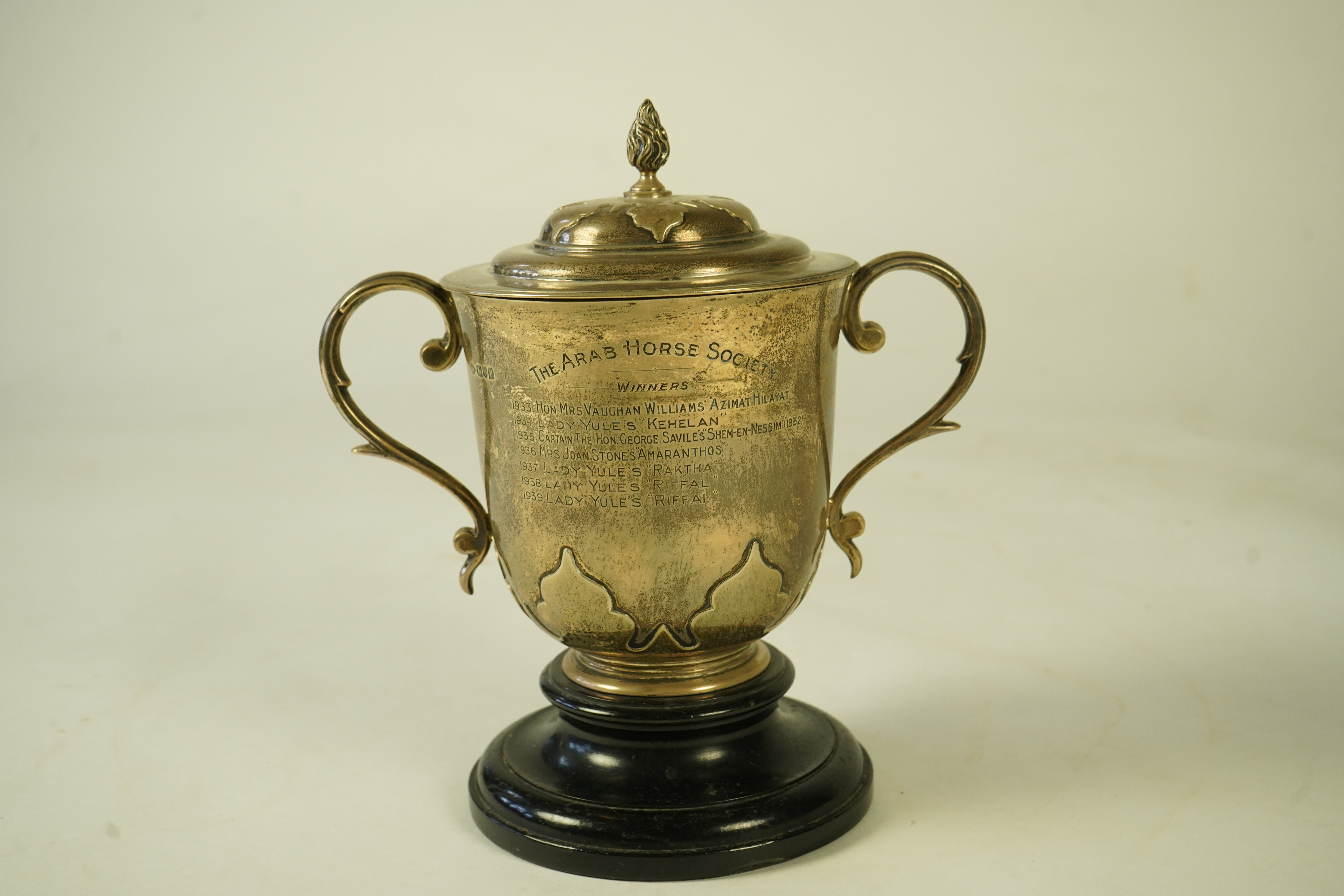 A George V silver two handled presentation cup and cover by Johnson, Walker & Tolhurst, with later engraved horse racing inscription relating to 'The Arab Horse Society Challenge Cup for the Best Arab Colt'